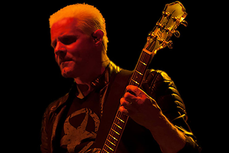 Paul Crook playing guitar